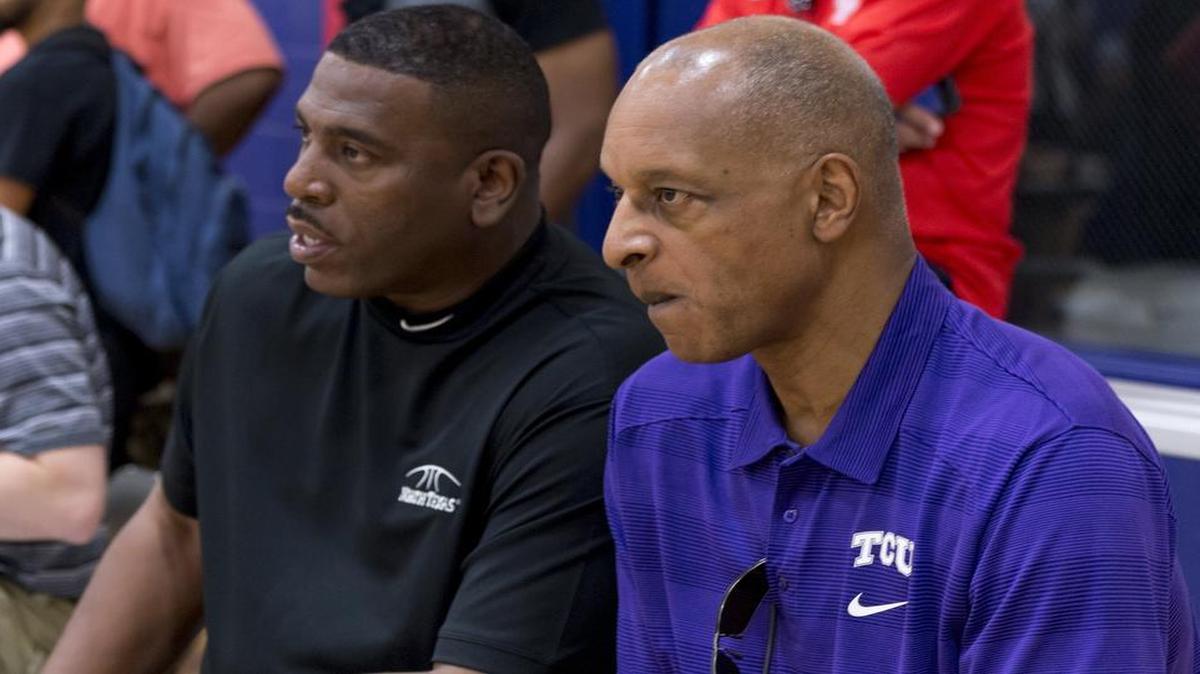 
TCU coach Trent Johnson (right) and North Texas coach Tony Benford watch a summer-league game in Duncanville two weeks ago. Johnson said this week that the Horned Frogs have more talent than they’ve had in his four years at TCU.
