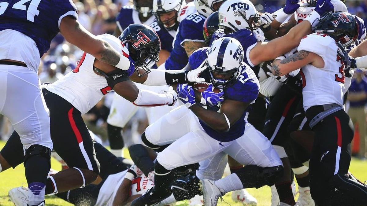 TCU running back Derrick Green scores a touchdown in the first half.