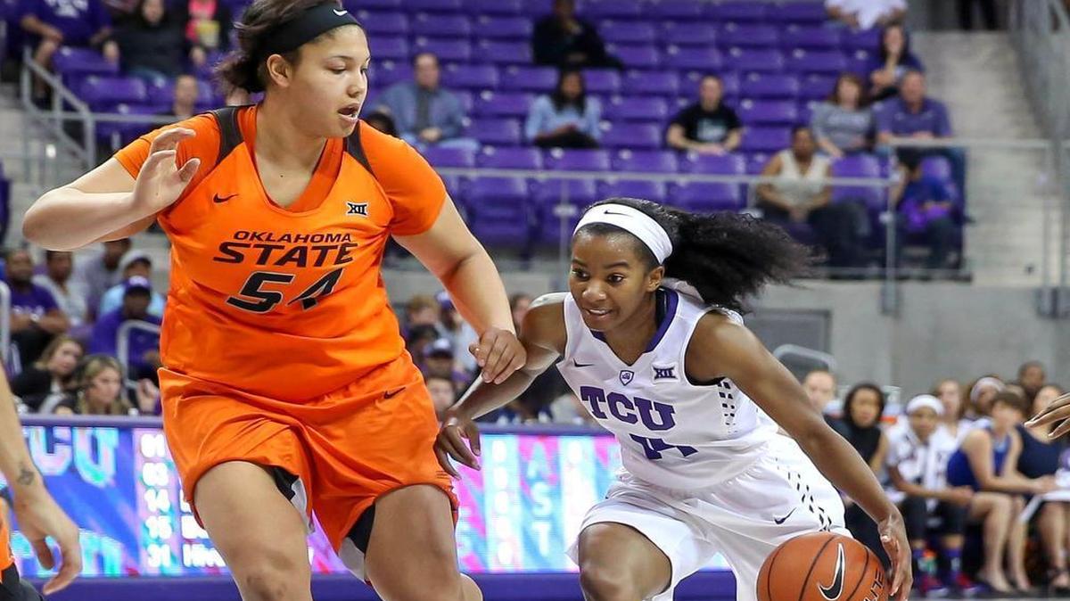 TCU guard Zahna Medley, right, tries to get past 6-foot-4 Oklahoma State center Kaylee Jensen. Medley scored 20 points, including 5 of 8 on 3-point attempts to set the Horned Frogs career record for 3s.