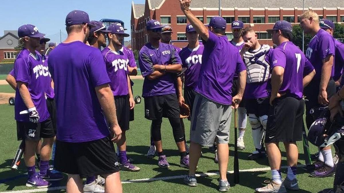 TCU hitting coach Bill Mosiello provides instruction at practice Thursday at Creighton University. The Horned Frogs were leading the College World Series in hits, average, runs, home runs and walks through the first eight games played.