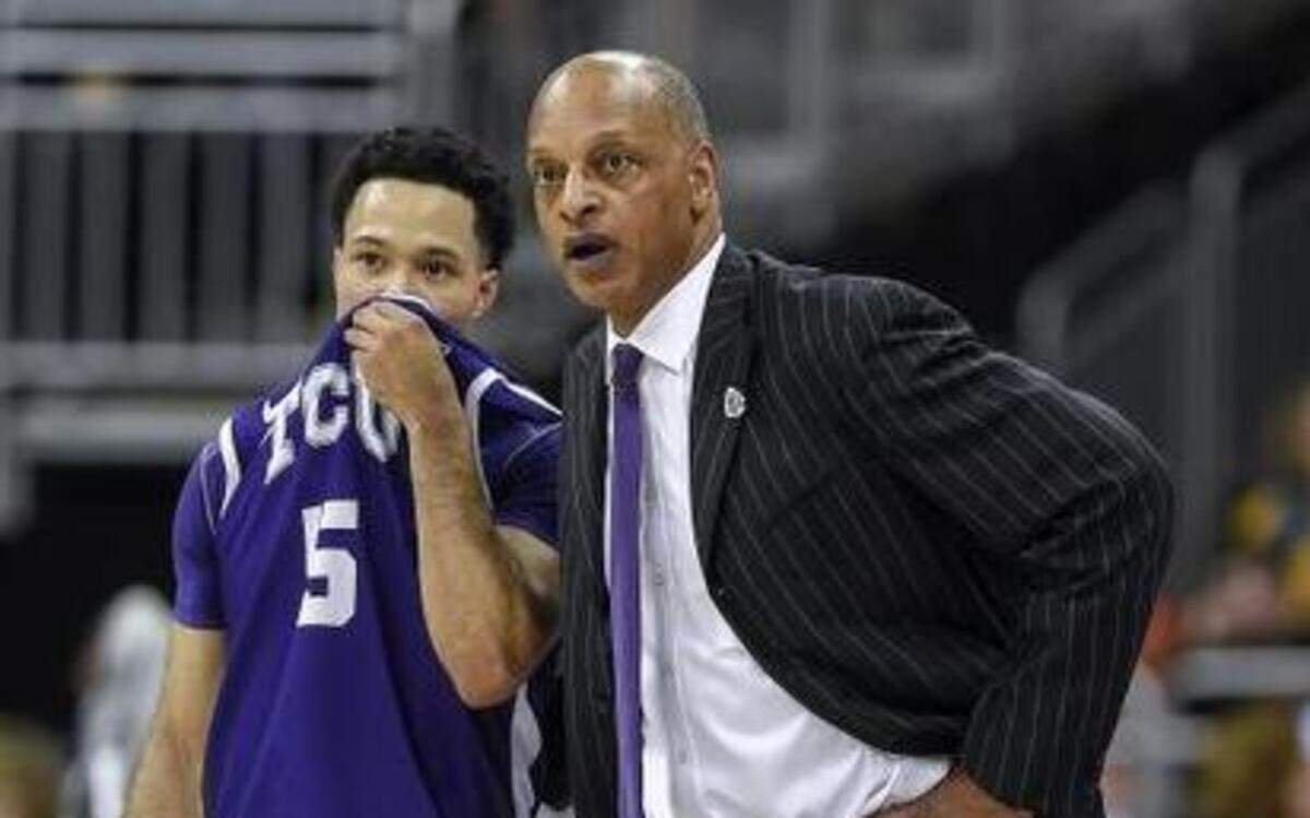 
TCU coach Trent Johson and point guard Kyan Anderson meet during the late moments of Wednesday’s Big 12 tournament game victory against Kansas State. The win was a high point in a trying two-week period for the Horned Frogs.
