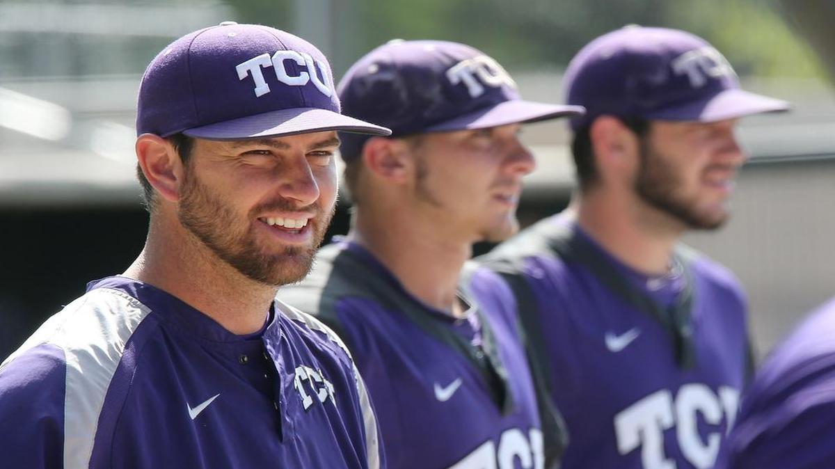 TCU pitching coach Kirk Saarloos, left, in 2014 at Lupton Stadium, reportedly was a candidate for the head coaching position at Rice but has decided to stay with the Horned Frogs, a source said Monday.