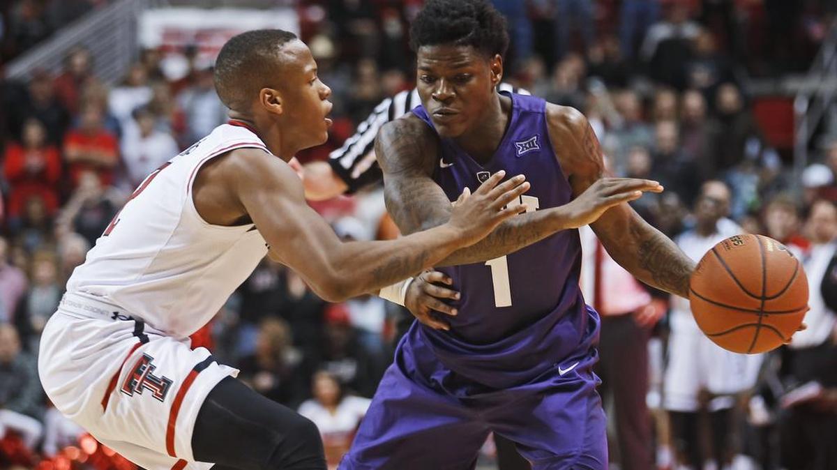 TCU’s Chauncey Collins, right, scored a career-high 29 points Tuesday night, but it wasn’t enough to hold off Devon Thomas and Texas Tech.