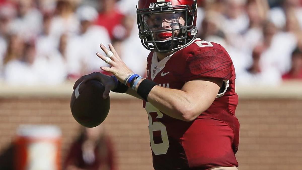 FILE - In this Saturday, Oct. 7, 2017 file photo, Oklahoma quarterback Baker Mayfield (6) looks for a receiver in the first quarter of an NCAA college football game against Iowa State in Norman, Okla.