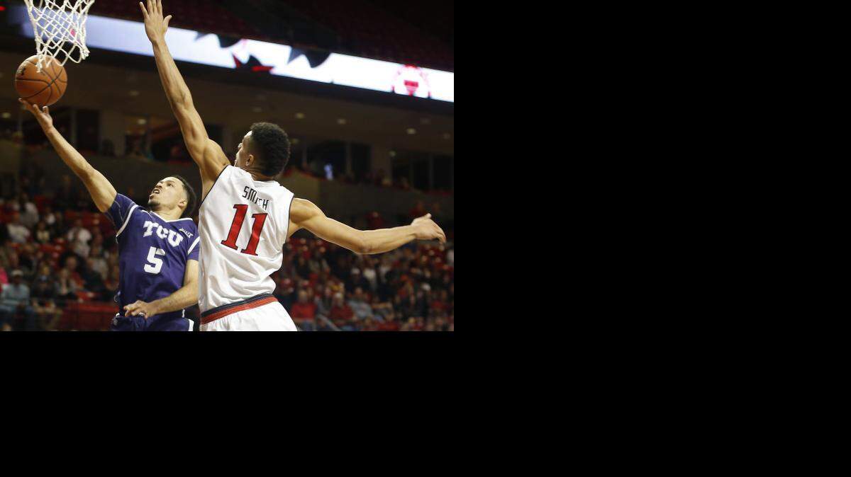 
TCU guard Kyan Anderson, left, led the Frogs with 19 points, three assists and two steals against Texas Tech.
 
