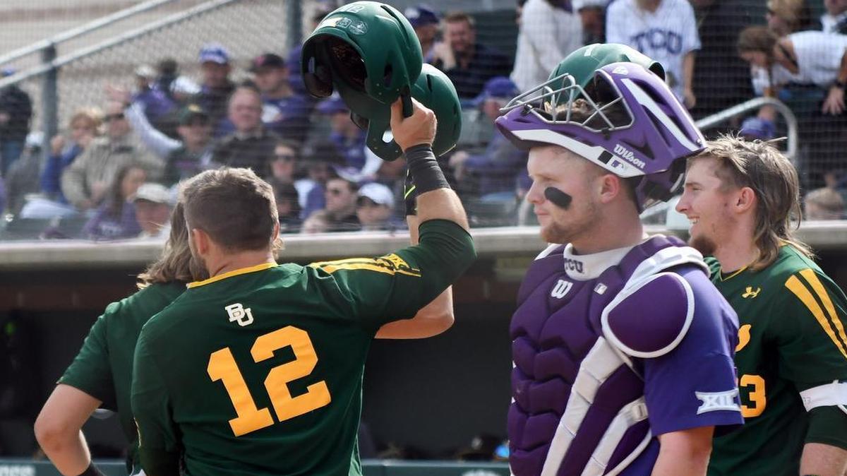 TCU catcher Evan Skoug stands at the plate as Baylor’s Matt Menard celebrates a two-run home run that provided a 9-0 lead in the fourth inning Saturday at Lupton Stadium.