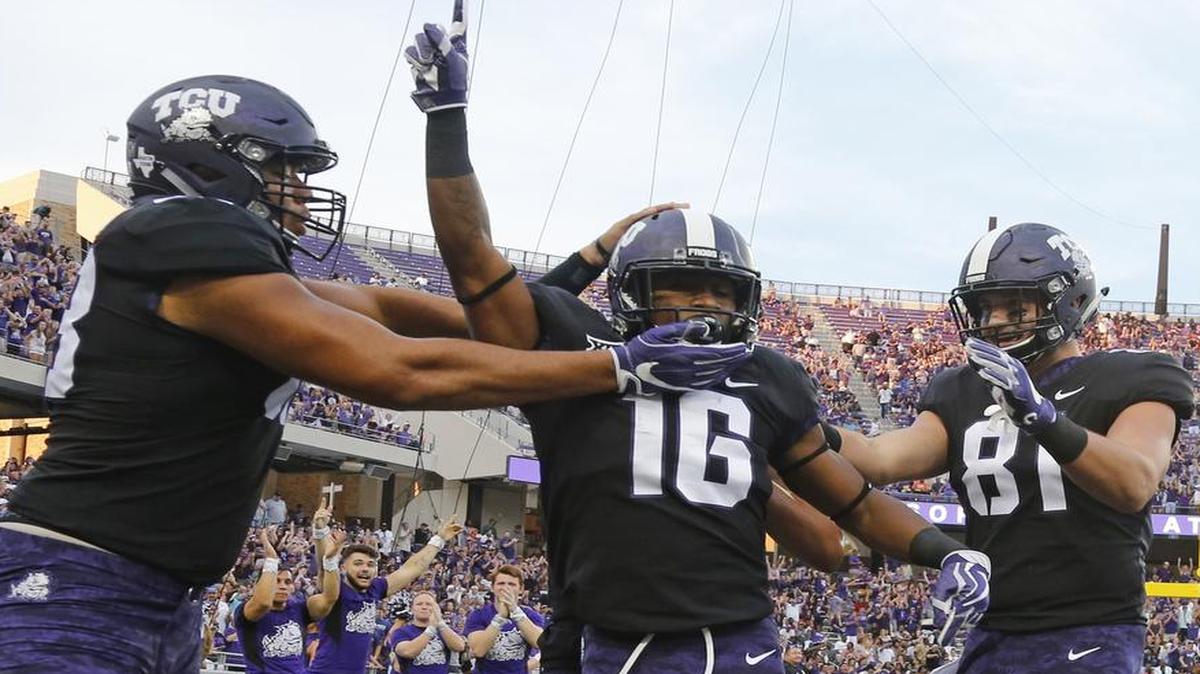 TCU running back Kenedy Snell celebrates with teammates after his first-quarter touchdown against Jackson State.