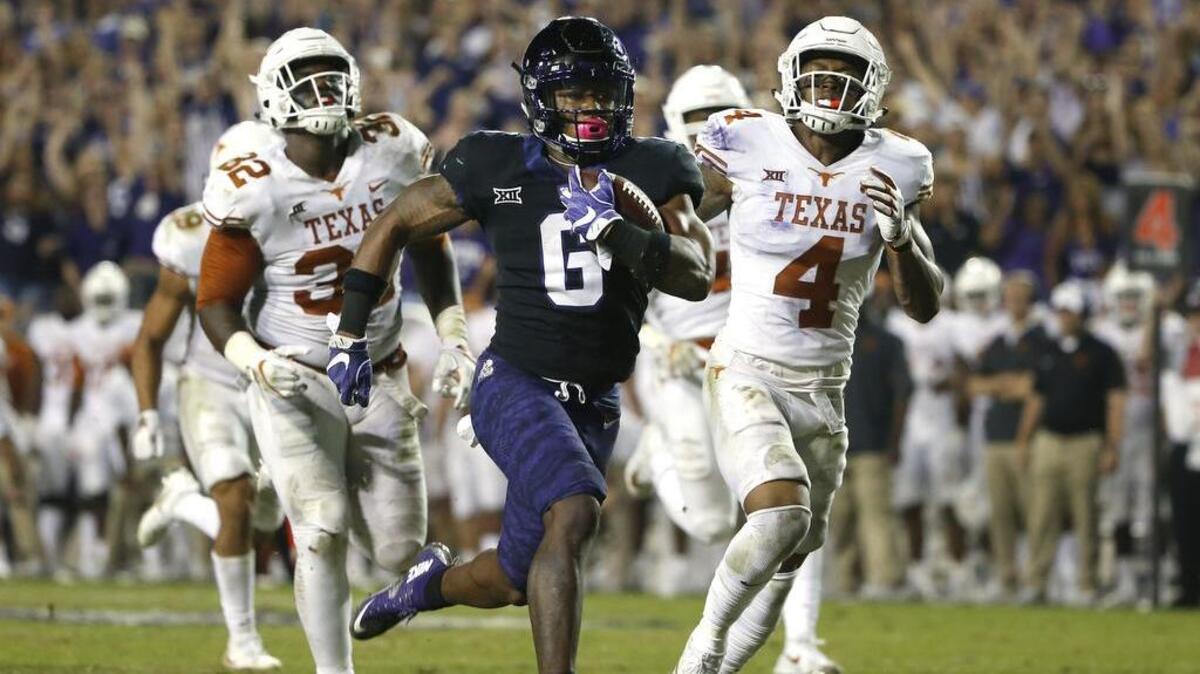 Running back Darius Anderson (6) and TCU ran away from Texas last week at Amon G. Carter Stadium. The Frogs, ranked sixth in the latest College Football Playoff poll, travel to No. 5 Oklahoma on Saturday.