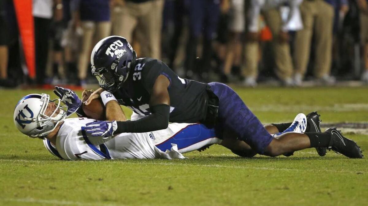TCU linebacker Travin Howard comes down on Kansas quarterback Peyton Bender for one of the Horned Frogs’ four sacks in a 43-0 victory last week at Amon G. Carter Stadium.