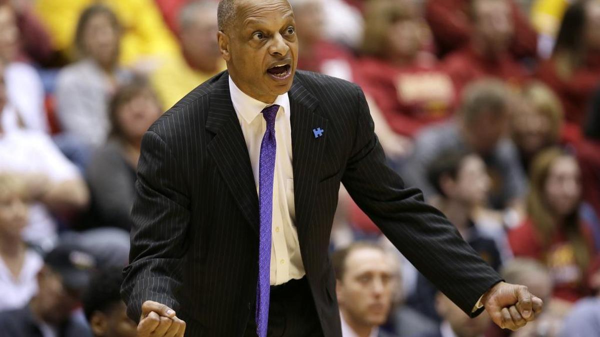 TCU coach Trent Johnson sends directions to his team during first-half action Saturday at Iowa State. The Horned Frogs lost 92-83, but played one of their best offensive games of the season.