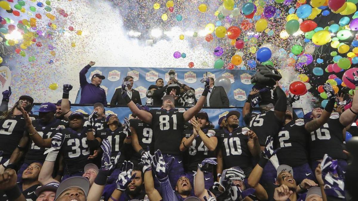 TCU football celebrates its 39-37 win over Stanford in the Valero Alamo Bowl at the Alamodome in San Antonio on Dec. 28.