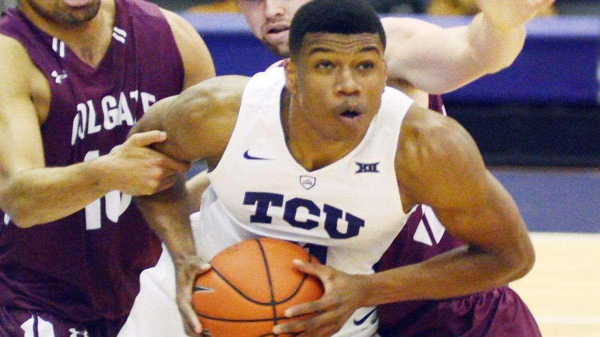 Brandon Parrish, grabbing a rebound Saturday during the Horned Frogs’ victory over Colgate, and TCU face Washington on Tuesday.