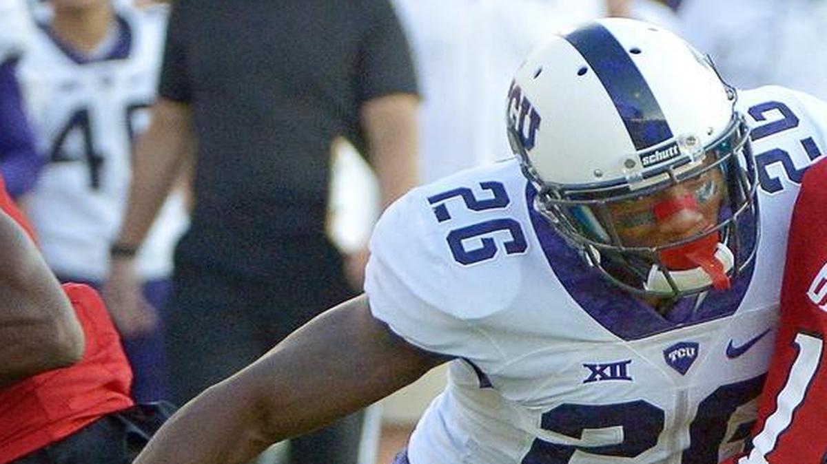 TCU safety Derrick Kindred moves in for a tackle against Texas Tech receiver Cameron Batson during the Big 12 game on Sept. 26 in Lubbock. Kindred was one of four TCU players named to the first team on the AP All-Big 12 squad.