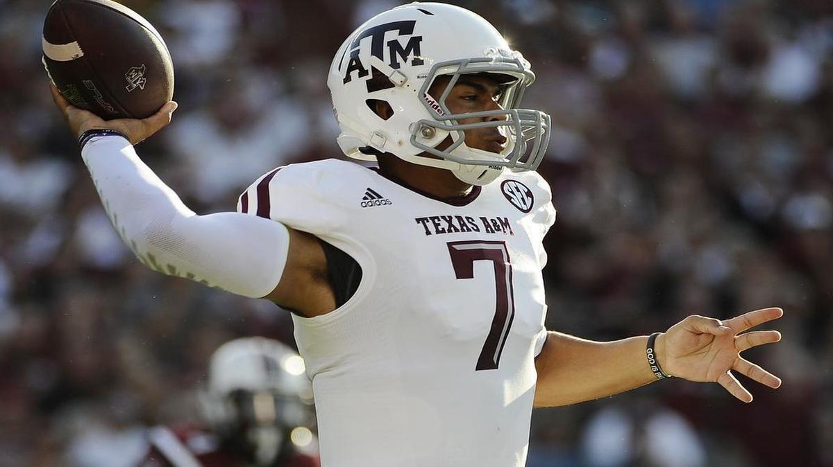 
Kenny Hill prepares to release a pass in the Aggies’ season opener at South Carolina last season. He threw for a school-record 511 yards in the A&M victory, the high point of a sesaon that ended in personal disappointment and led eventually to a transfer to TCU.

