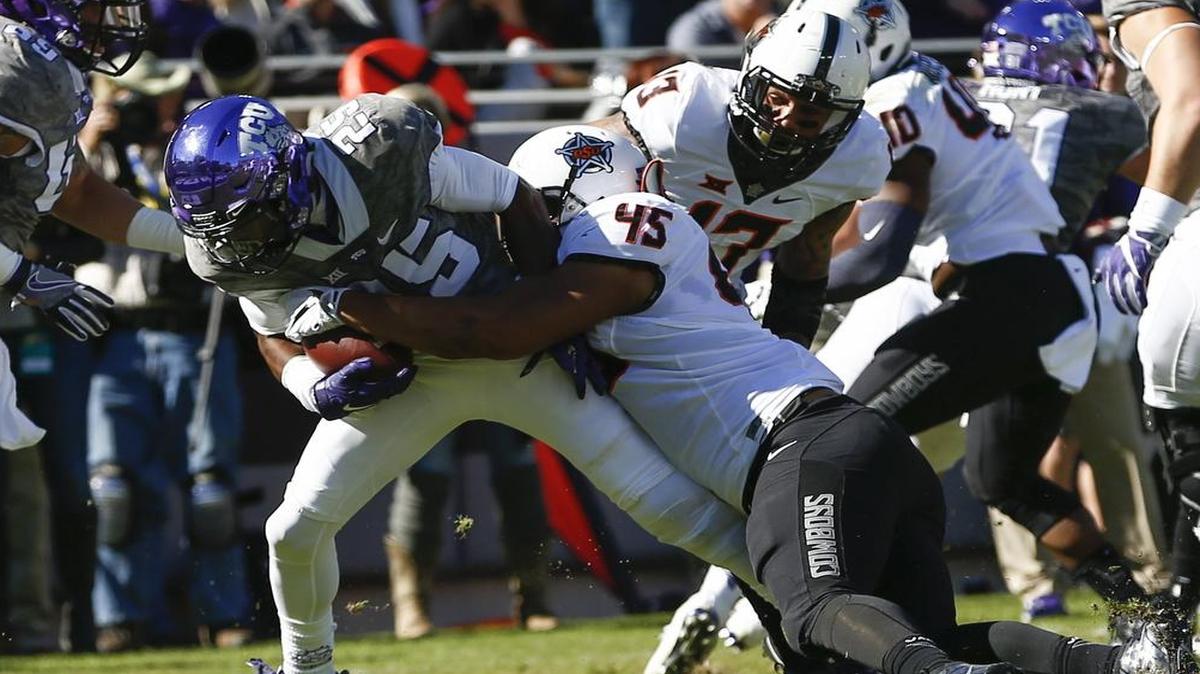 TCU receiver KaVontae Turpin heads for the end zone and a first-quarter touchdown Saturday against Oklahoma State.
