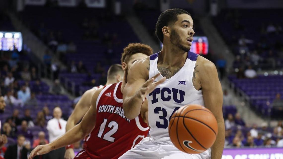 TCU guard Kenrich Williams looks to drive around the defense of South Dakota forward Trey Burch-Manning during a Nov. 15 game at Schollmaier Arena. Williams averaged 17.0 points and 11.7 rebounds in victories against New Mexico and St. Bonaventure at the Emerald Coast Classic last weekend.