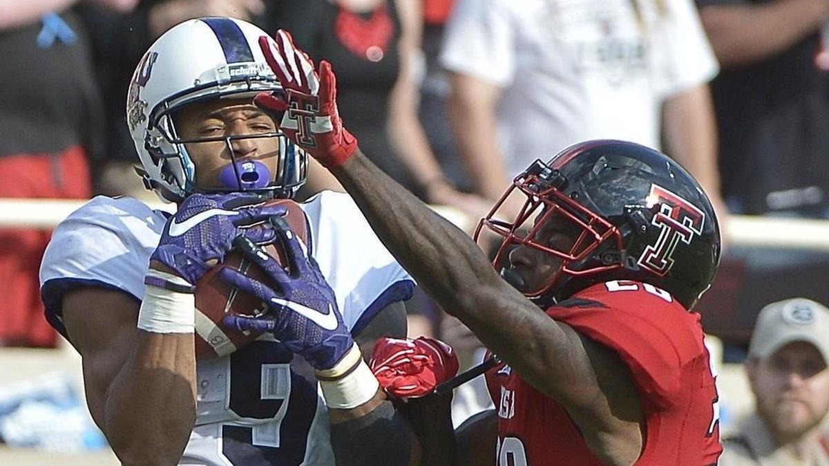 TCU receiver Josh Doctson brings in a catch against the defense of Texas Tech defensive back Paul Blanks in a Sept. 26, 2015, game at Lubbock. Doctson caught 18 passes for 267 yards and three touchdowns in the Horned Frogs’ 55-52 victory.