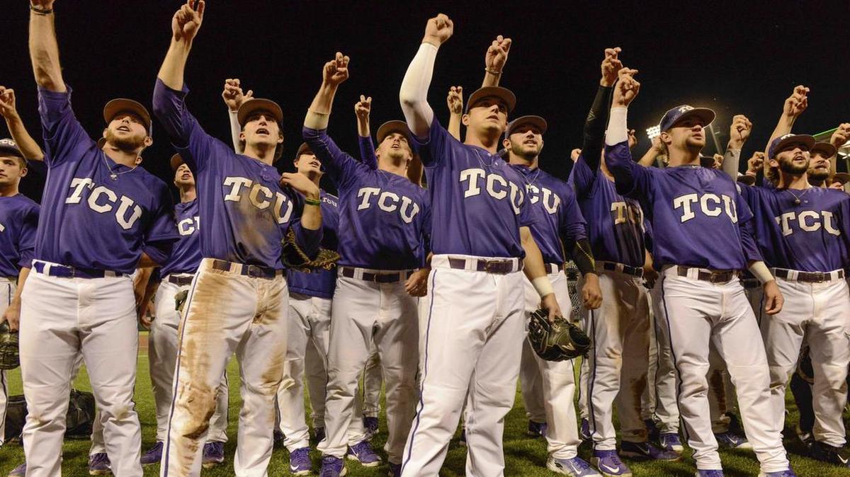 The TCU baseball team celebrates with the Lupton Stadium fans after an 8-4 victory against LSU in an elimination game at the College World Series in June last year. The Horned Frogs, who finished 51-15, begin the season Feb. 19 as the Big 12 coaches’ pick to win the league title.