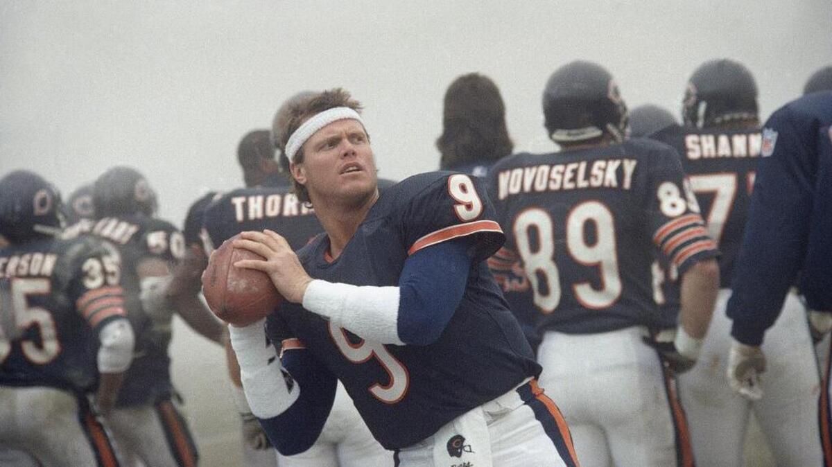 Jim McMahon, winner of the 2017 Davey O’Brien Legends Award, warms up before a Chicago Bears’ playoff game against Philadelphia on Jan. 6, 1989.