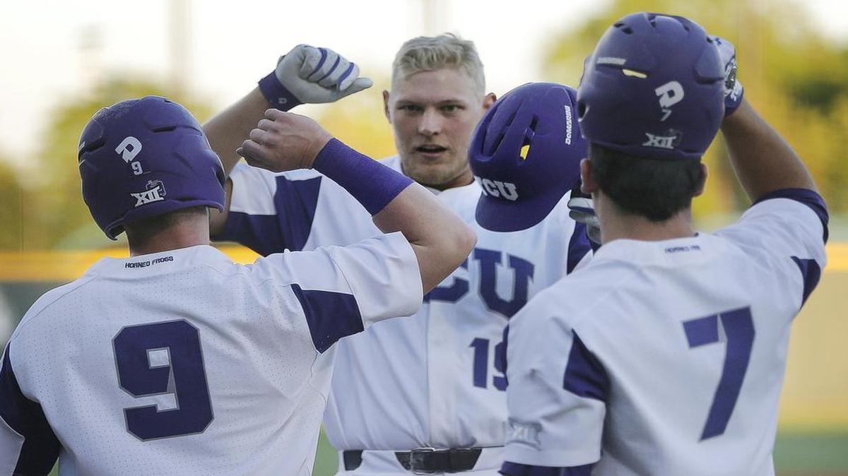 TCU designated hitter Luken Baker is greeted at home plate after hitting a two-run home run in the third inning Friday night against Murray State.