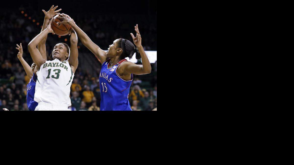 
Kansas forward and DeSoto High School graduate Chelsea Gardner, right, leads her team in scoring but also provides defense such as this block against Baylor’s Nina Davis.


