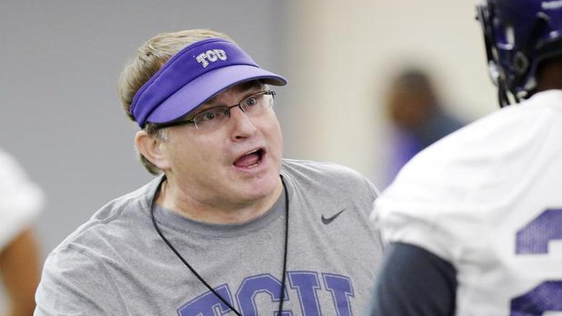 TCU coach Gary Patterson gives instructions during the team’s first spring practice on Feb. 26. After six practices, the coaching staff is looking at quarterbacks, searching for cornerbacks and defensive tackles and seeking the right mix on the offensive line.