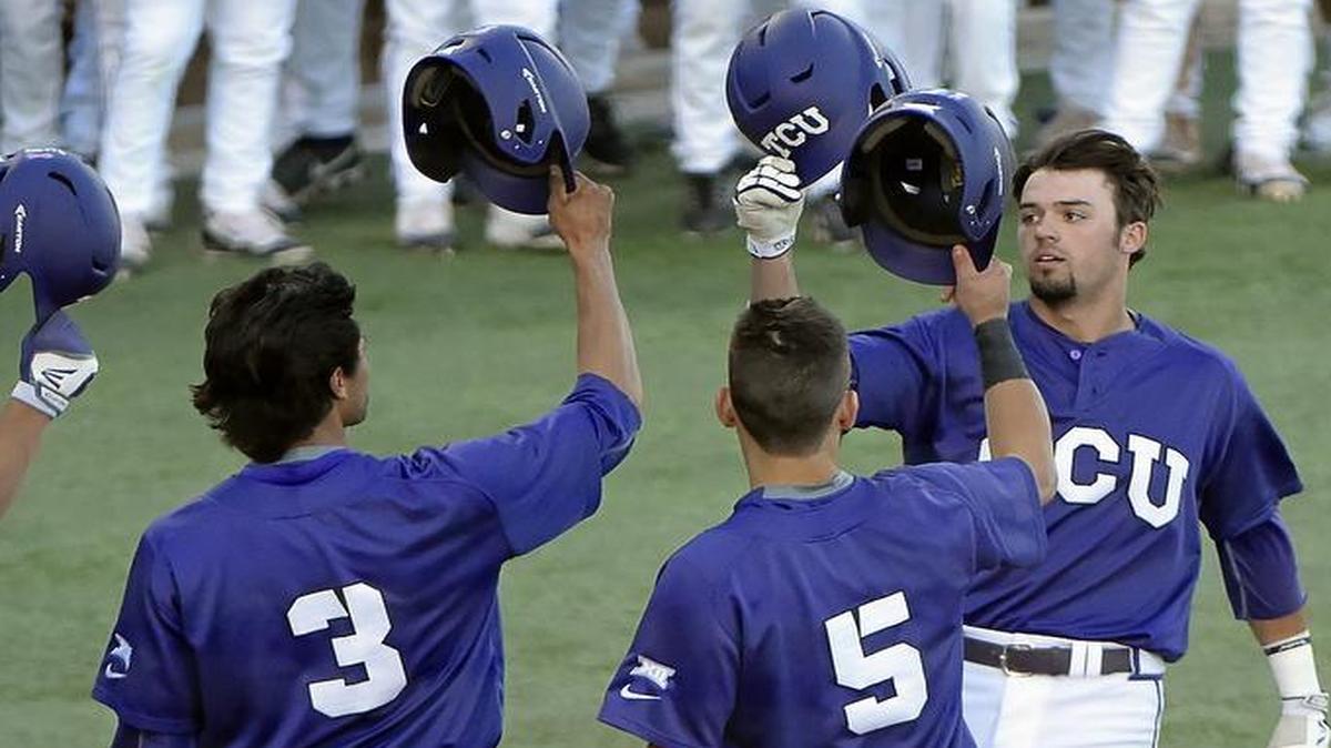 TCU outfielder Dane Steinhagen, right, is greeted at at home plate by Zack Plunkett (38), Elliott Barzilli (3) and Ryan Merrill after his three-run home run in the first inning Tuesday against Abilene Christian. The Horned Frogs won 6-4, extending their win streak to five games.