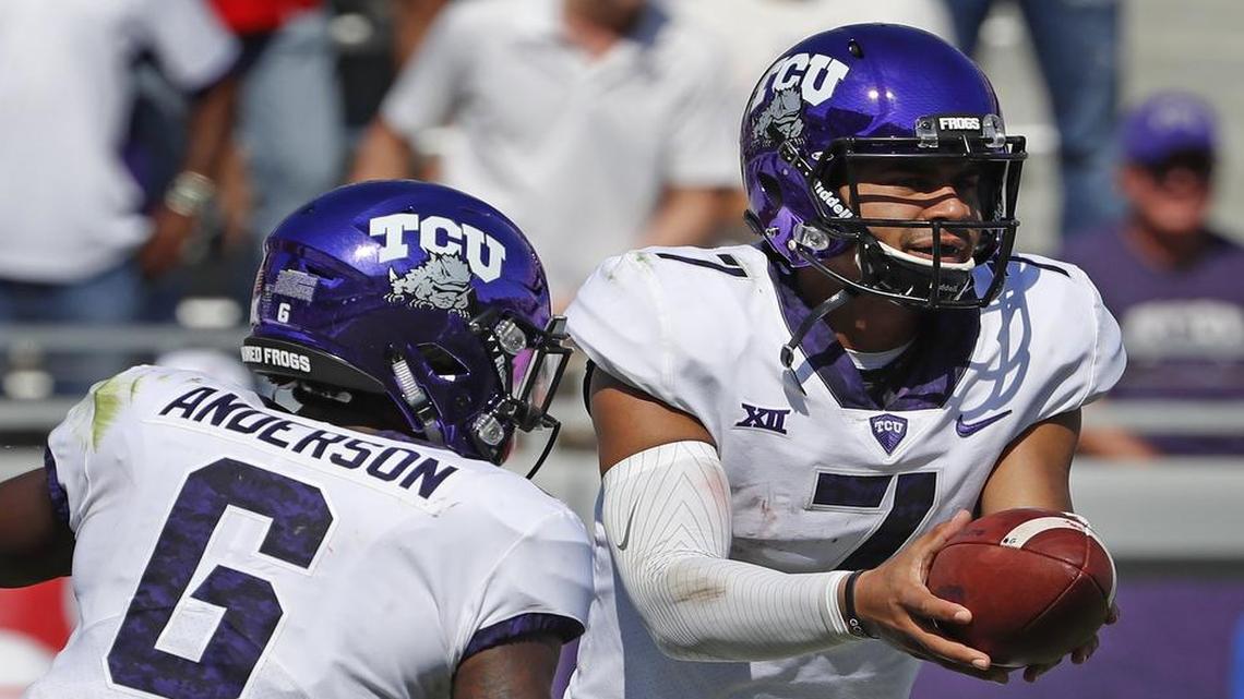 TCU quarterback Kenny Hill hands off to running back Darius Anderson in the second quarter of a Sept. 16 game against SMU.
