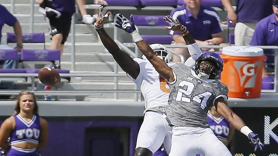 TCU cornerback Julius Lewis goes up with tight end DeAndre McNeal in pass coverage during a game against Texas last season at Amon G. Carter Stadium. Lewis, who started four games as a freshman in 2015, played in his first game of 2016 last week after returning from injury.
