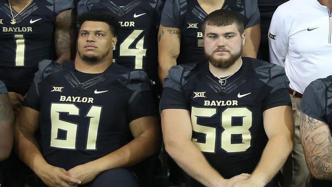 The numbers of Baylor seniors Jarell Broxton (61) and Spencer Drango (58) reflect the score of last year’s victory over TCU.