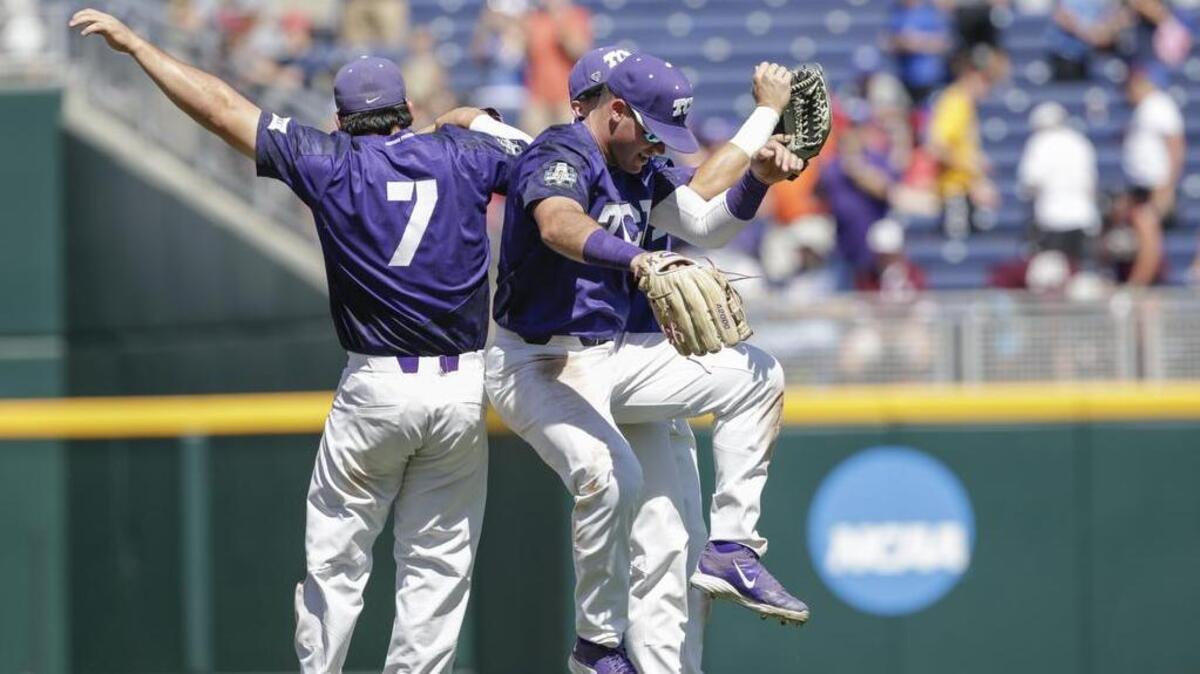 TCU outfielders Josh Watson (left), Austen Wade and Nolan Brown celebrate after a 4-1 victory against Texas A&M in an elimination game at the College World Series in Omaha, Neb., on June 20.