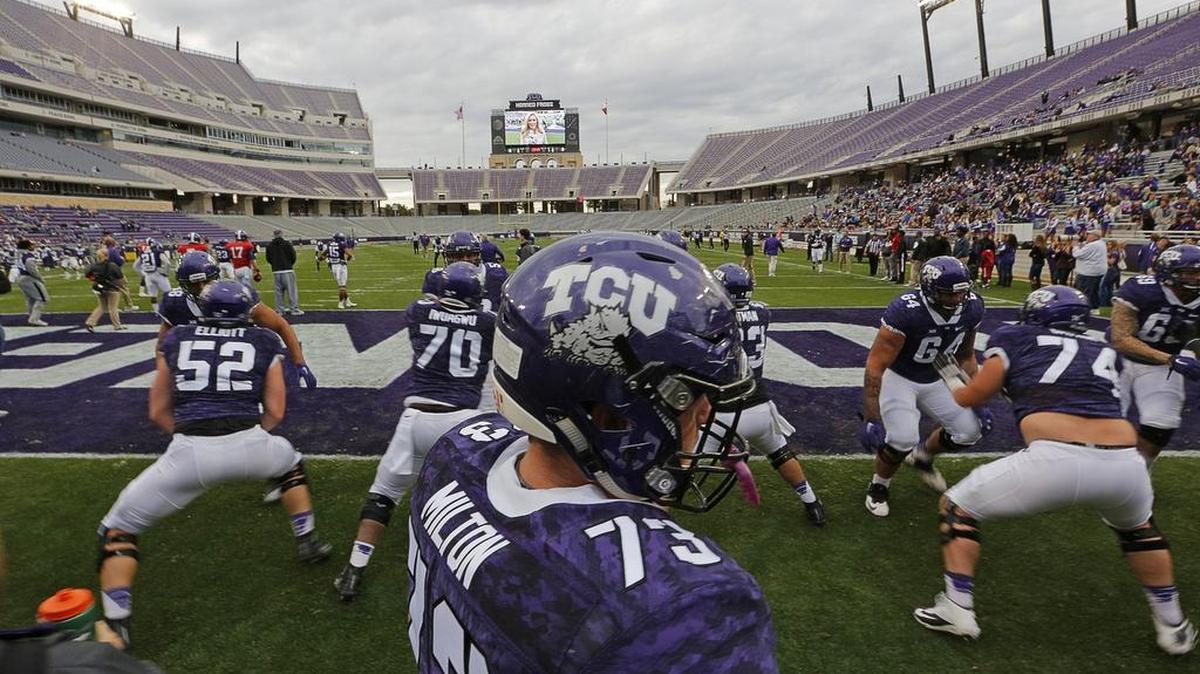 Backup center Jozie Milton waits for his turn in warmups for the TCU spring scrimmage April 1 at Amon G. Carter Stadium.