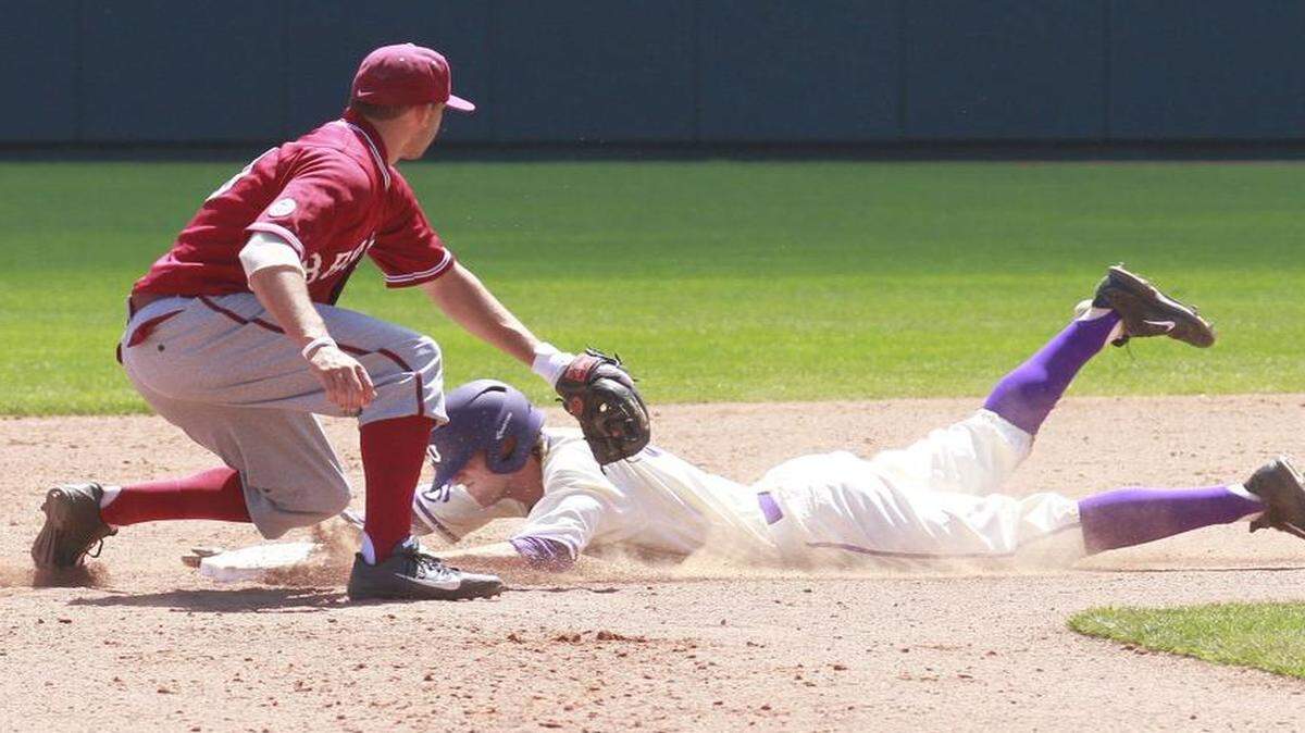 
Jeremie Fagnan, (32) of TCU slides safe into second base against Jose Vizcaino Jr. (10) of Santa Clara during the sixth inning Sunday. 
