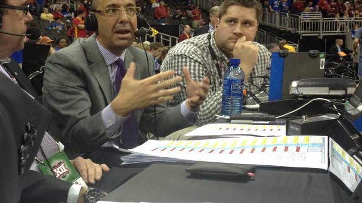 
TCU athletic director Chris Del Conte talks with the radio broadcast team before the start of the TCU-Kansas basketball game Thursday in Kansas City. He said the Big 12 athletic directors feel good about recommending the co-champion rule be dropped in football.
