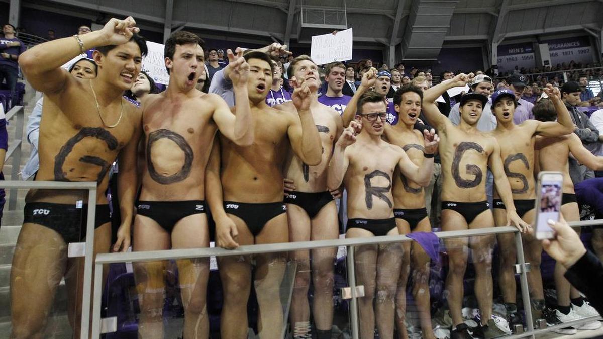 Speedo-wearing TCU fans cheer on the men’s basketball team during the first half of an NCAA college basketball game against West Virginia at TCU, Monday, January 22, 2018.