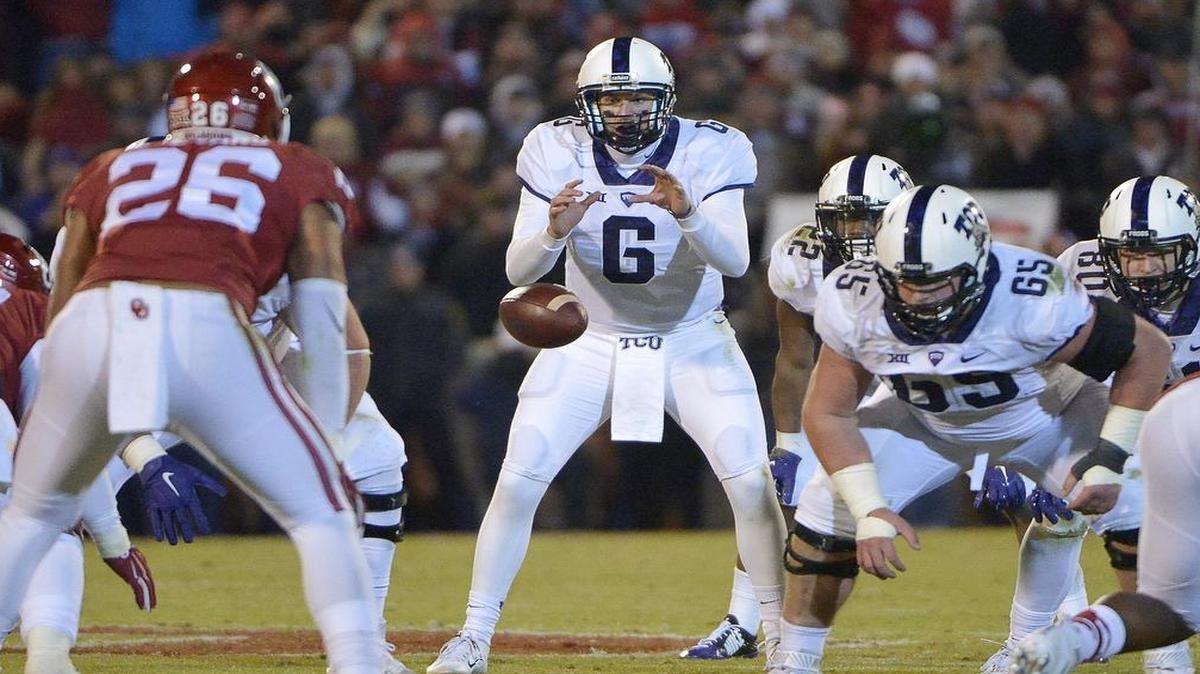 TCU quarterback Bram Kohlhausen takes a shotgun snap during the fourth quarter of last year’s game at Oklahoma. This season’s game in Fort Worth has a 4 p.m. kickoff on Oct. 1, the Big 12 announced Monday.
