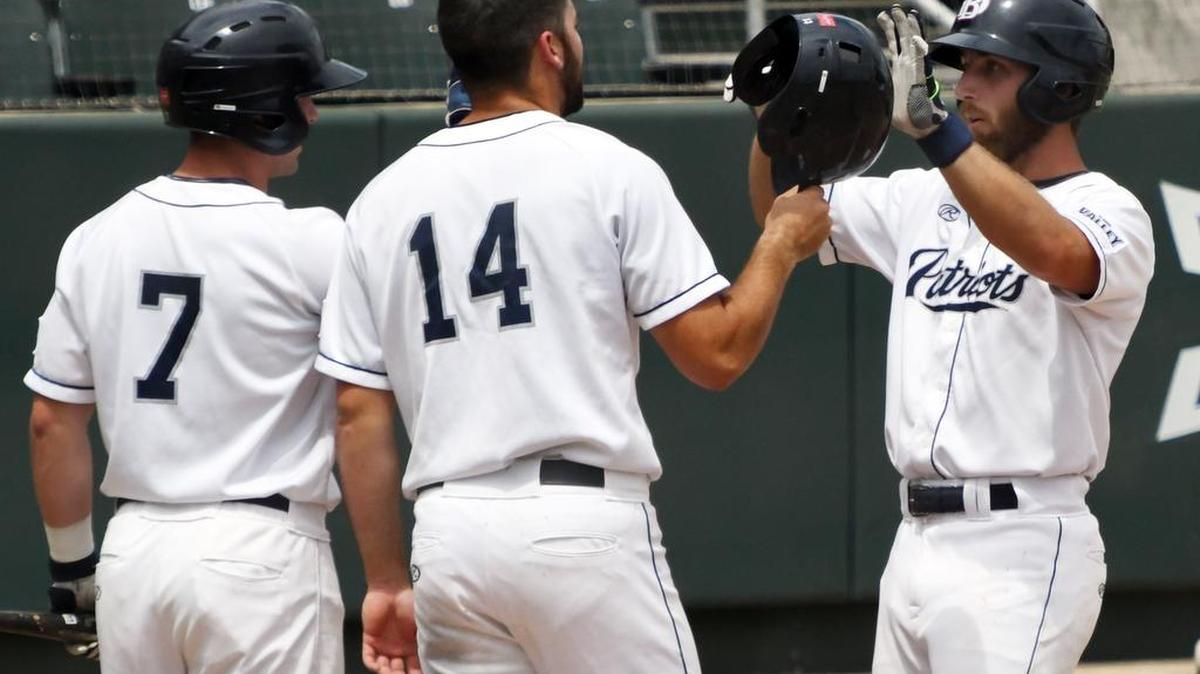 Dallas Baptist’s Matt Duce, left and Devlin Granberg celebrate with Austin Listi after Listi’s two-run home run to give DBU a 7-1 lead over Virginia in the second inning of Monday’s June 5, 2017 Fort Worth Regional baseball game at Lupton Stadium, in Fort Worth, Texas.