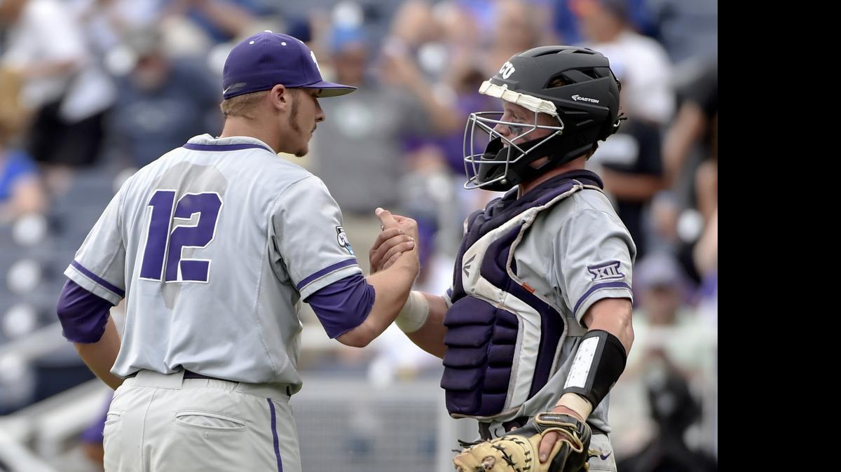 
TCU closer Riley Ferrell, left, and catcher Evan Skoug shake hands after Ferrell dominated LSU in the ninth inning. 


