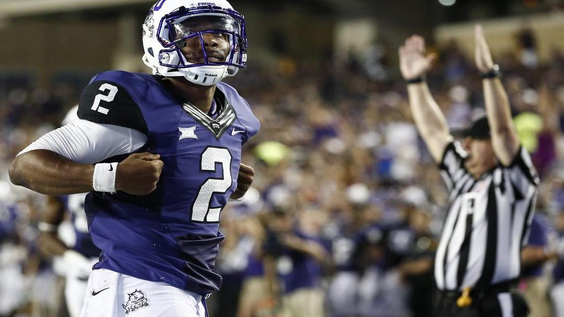 
Trevone Boykin looks to the crowd after his touchdown run in the season opener against Samford last year, the start of a record season for the TCU quarterback and the Horned Frogs’ offense.
