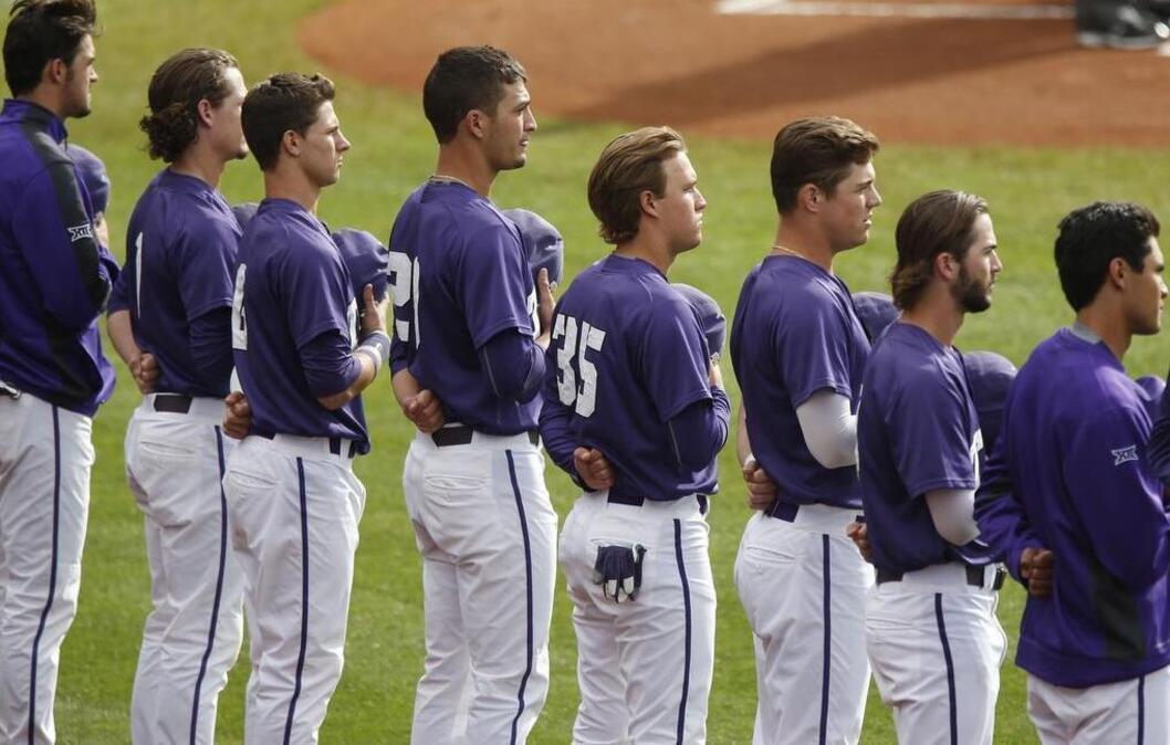 
The TCU baseball team stands for the national anthem before its game against Texas Tech on Thursday at the Big 12 tournament. The Horned Frogs’ 8-1 loss swept them out of the event, sending them home with consecutive losses for the first time, as the NCAA playoffs begin next week.
