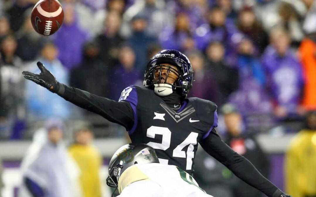 TCU cornerback Julius Lewis reaches for a pass in last year’s game against Baylor. He was expected to miss 2016 because of injury but has returned to practice, coach Gary Patterson said.