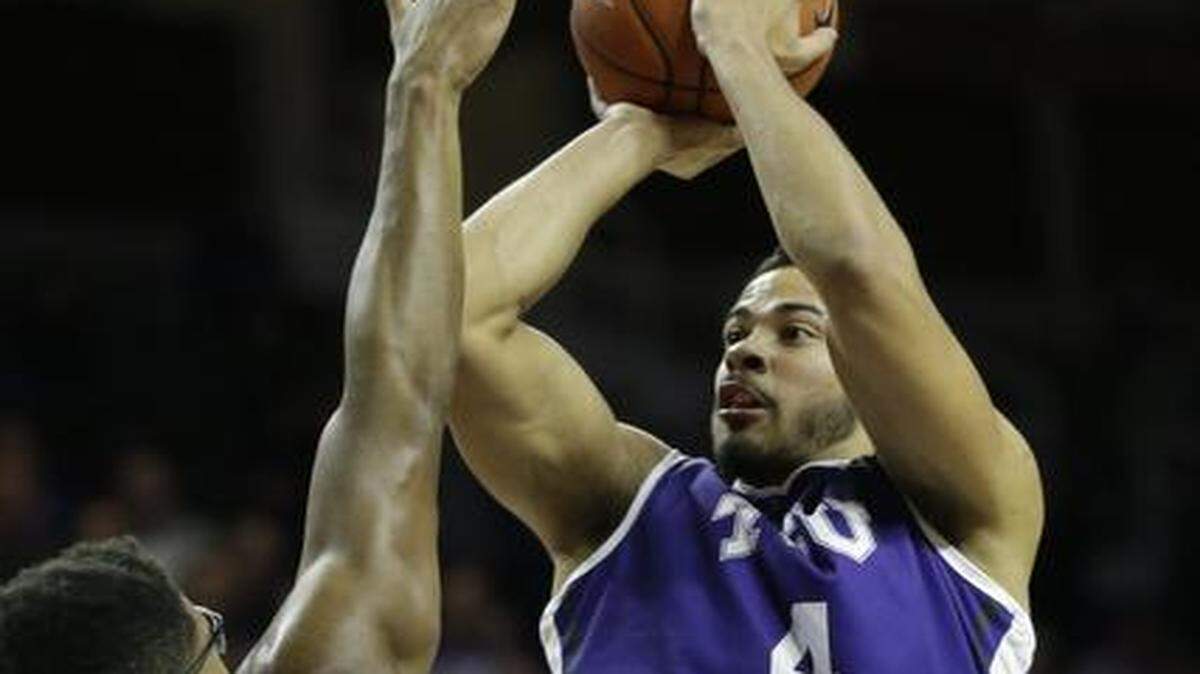 
Forward Amric Fields, putting up a shot against Kansas State, says TCU has “shown that we can play with anybody.”
