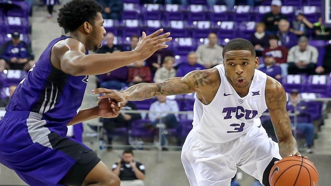 TCU guard Malique Trent drives against the defense of ACU’s Jaylen Franklin during the first half of Sunday’s game. Trent finished with a season-high 24 points and had four assists in the Horned Frogs’ 80-69 victory.