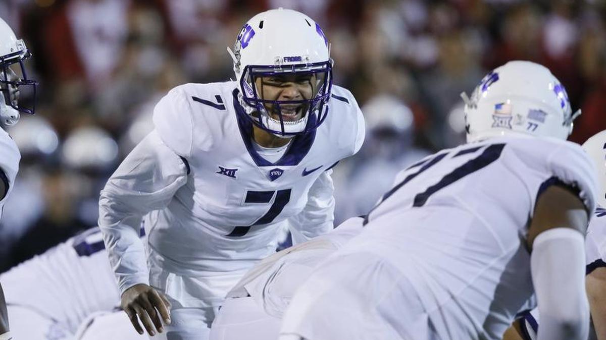 TCU quarterback Kenny Hill calls signals to teammates during last week’s game at Oklahoma. He and at least two other players will not make the trip to Texas Tech for Saturday’s game, coach Gary Patterson said.