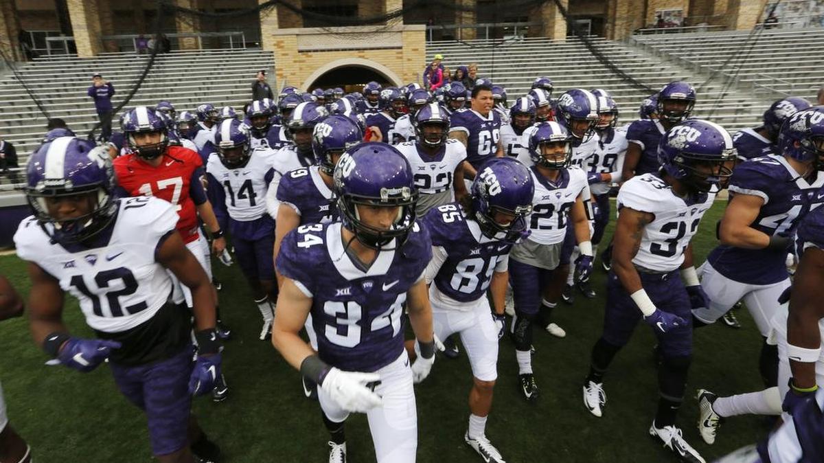 The players prepare to take the field for TCU’s spring scrimmage on April 1 at Amon G. Carter Stadium. The Horned Frogs are No. 25 on The Sporting News’ Preseason Top 25.