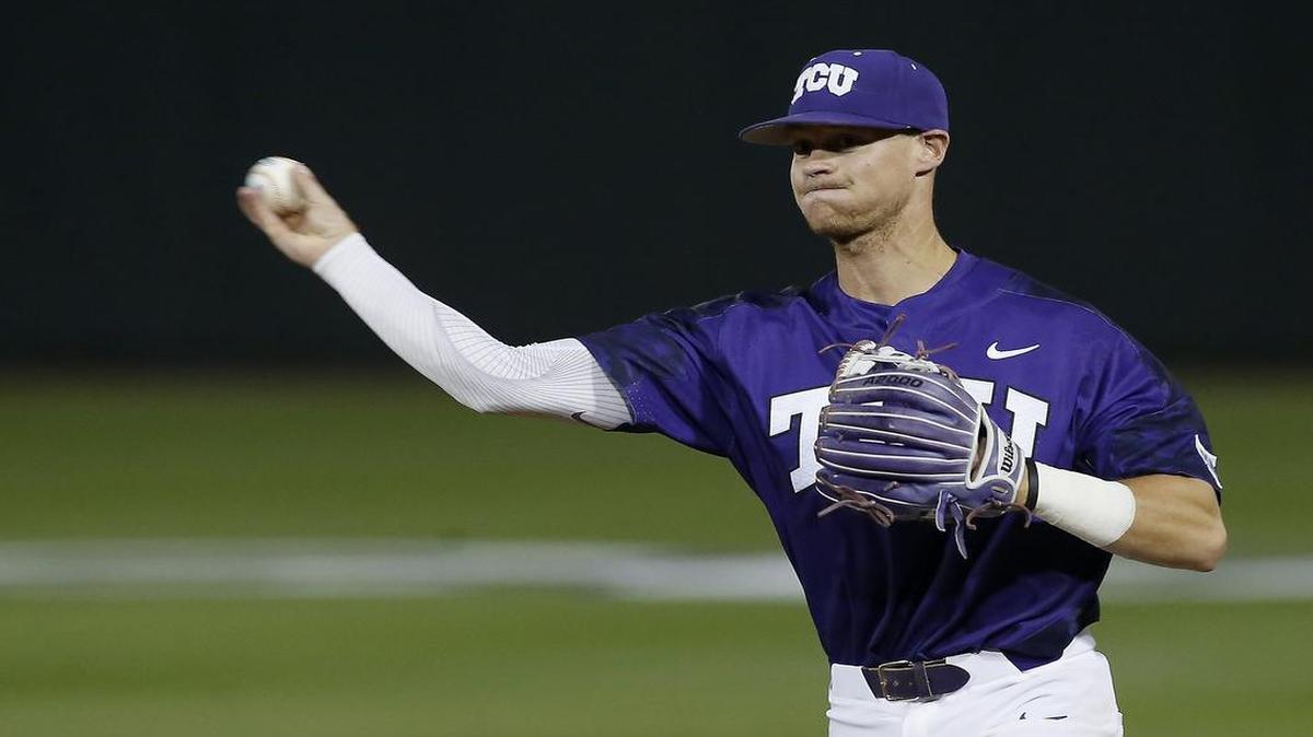 TCU infielder Cam Warner makes a throw to retire a batter in a game against Rice on Feb. 28 at Lupton Stadium.