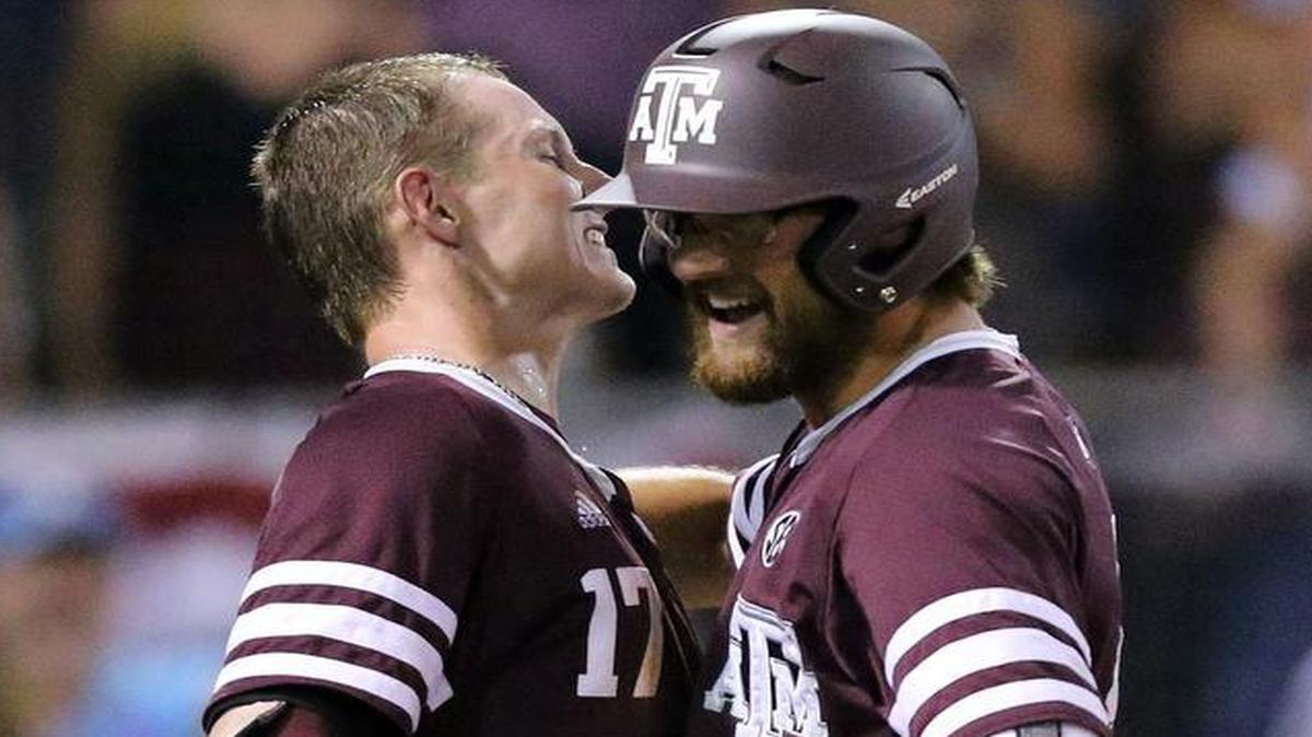 Texas A&M’s Jonathan Moroney, right, celebrates his home run with teammate Joel Davis during the sixth inning against TCU in College Station.
