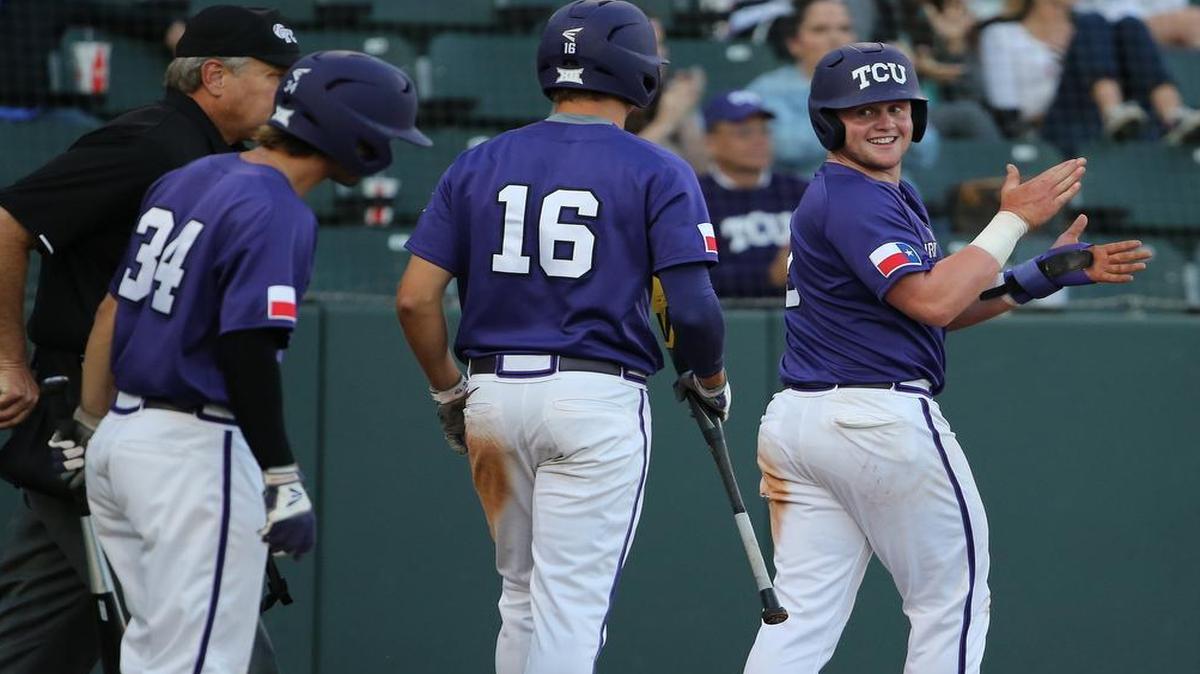 
TCU catcher Evan Skoug offers congratulations to Connor Wanhanen (center) after they scored on Keaton Jones’ triple in a game against Incarnate Word. Skoug and Wanhanen have combined to score 57 runs for the Horned Frogs.
