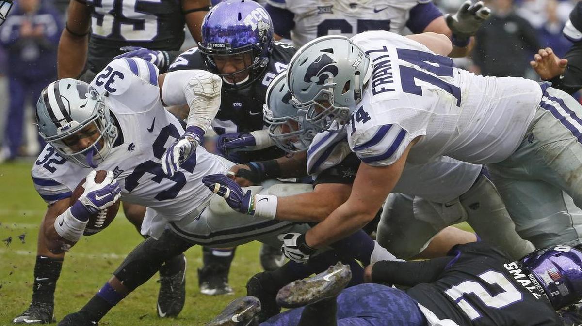 Kansas State running back Justin Silmon (32) rushed for 132 yards againt TCU, scoring twice, in a 30-6 victory in Fort Worth on Dec. 3. Kansas State had a total of 336 yards on the ground.