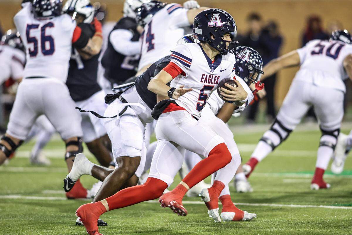 Allen quarterback Jeremiah Daoud runs the ball against North Crowley during the Class 6A Division I regional final Friday, Dec. 5, 2025, at DATCU Stadium in Denton.